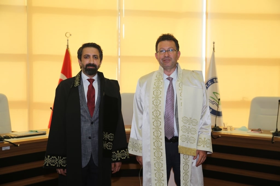 REKTÖR ERKAN, DOÇENTLİK UNVANI ALAN ÇAĞDAŞ ERTAŞ’A CÜBBESİNİ GİYDİRDİ