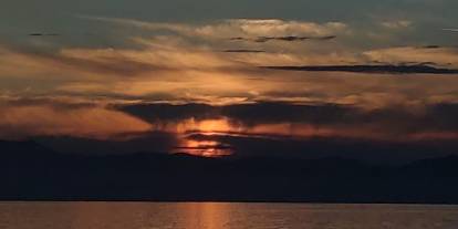 Van'da eş zamanlı güzellik: Ay doğarken güneş battı